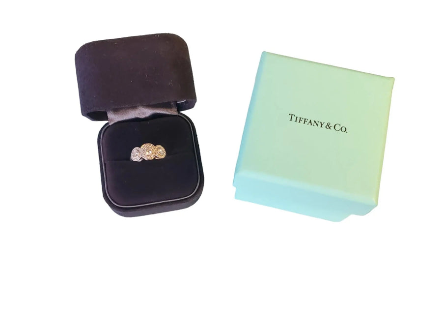 Tiffany & Co. Circlet Ring of Diamonds 3 Stone Halo Platinum .55tcw - Joseph Diamonds